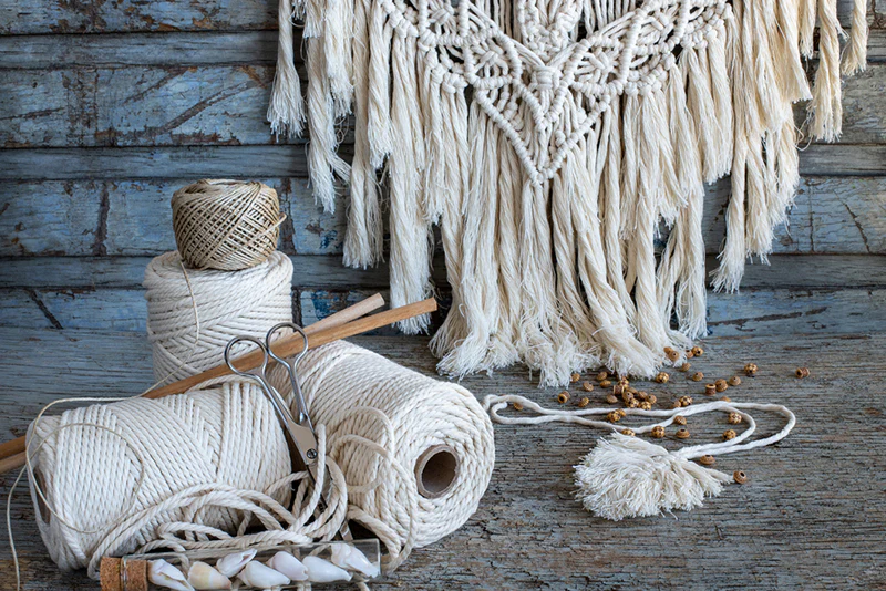 Handmade macramé wall hanging and cotton cords for boho home décor in Goa