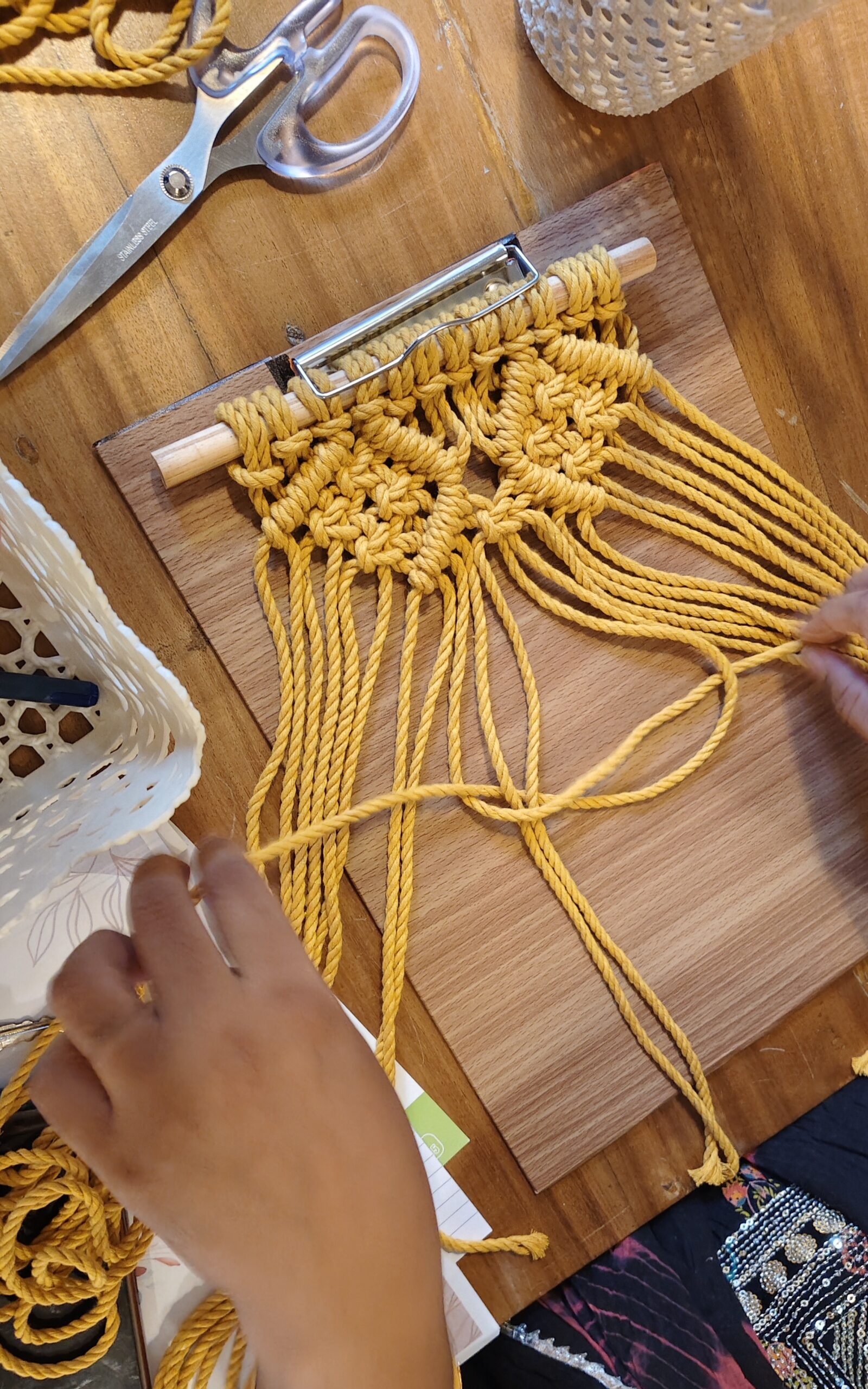 Hands-on macramé workshop in Goa with beginner learning knots and patterns