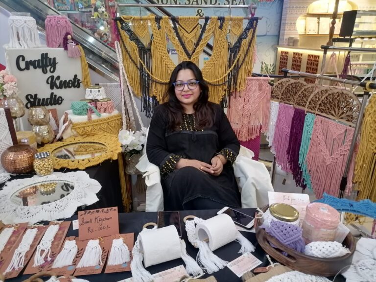 Macramé artist at Crafty Knots Studio stall in Goa showcasing handmade macramé decor
