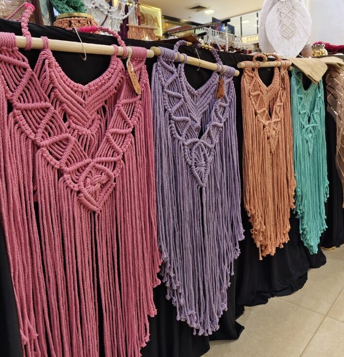 Colorful handmade macramé wall hangings displayed by Crafty Knots Studio in Goa