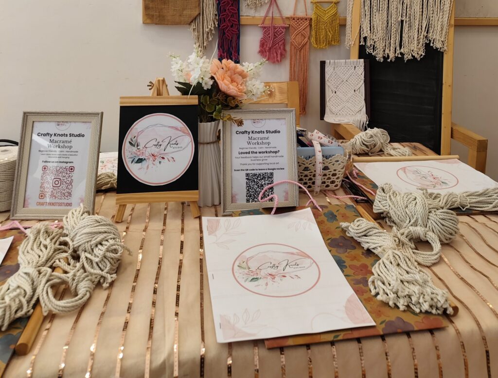 Macramé workshop table setup with DIY craft kits and materials arranged for participants in Goa.